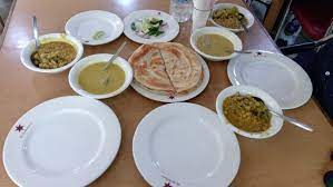 Riya Moni Hotel And Restaurant is a local food place.